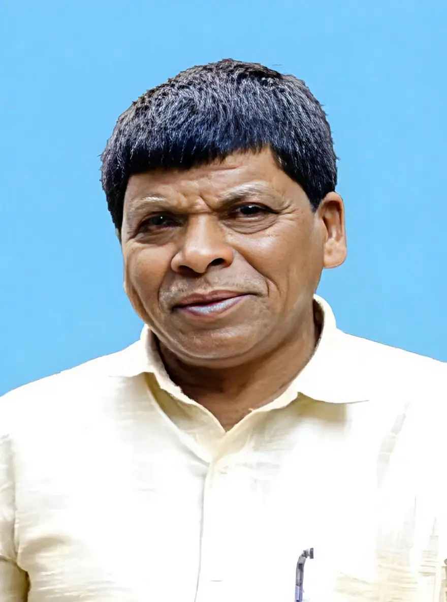 Person in light-colored shirt, blue background